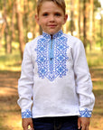 Boys’ white embroidered linen shirt with stand collar and blue geometric ornament