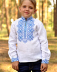 Festive boys’ white linen vyshyvanka with double-cross blue embroidery