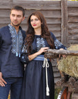 Women’s navy embroidered maxi dress with solid-color belt and men emroidered shirt