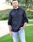 Black men’s linen vyshyvanka with black-on-black embroidery and transformable long sleeves
