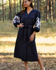 Elegant dark blue Ukrainian-style dress with rich white embroidery