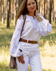 White women’s vyshyvanka in natural linen with refined white embroidery