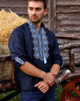 Men’s navy embroidered linen shirt with transformable sleeves and detailed front embroidery