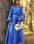 Cornflower blue linen embroidered maxi dress with white rose ornament