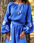 Women’s blue embroidered linen dress with long sleeves and removable belt