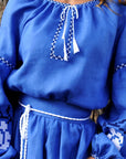 Elegant cornflower blue Ukrainian-style maxi dress with white floral embroidery