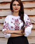 White linen women’s vyshyvanka with traditional red and black embroidery