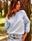 Light blue linen women’s vyshyvanka with white and gray-blue embroidery