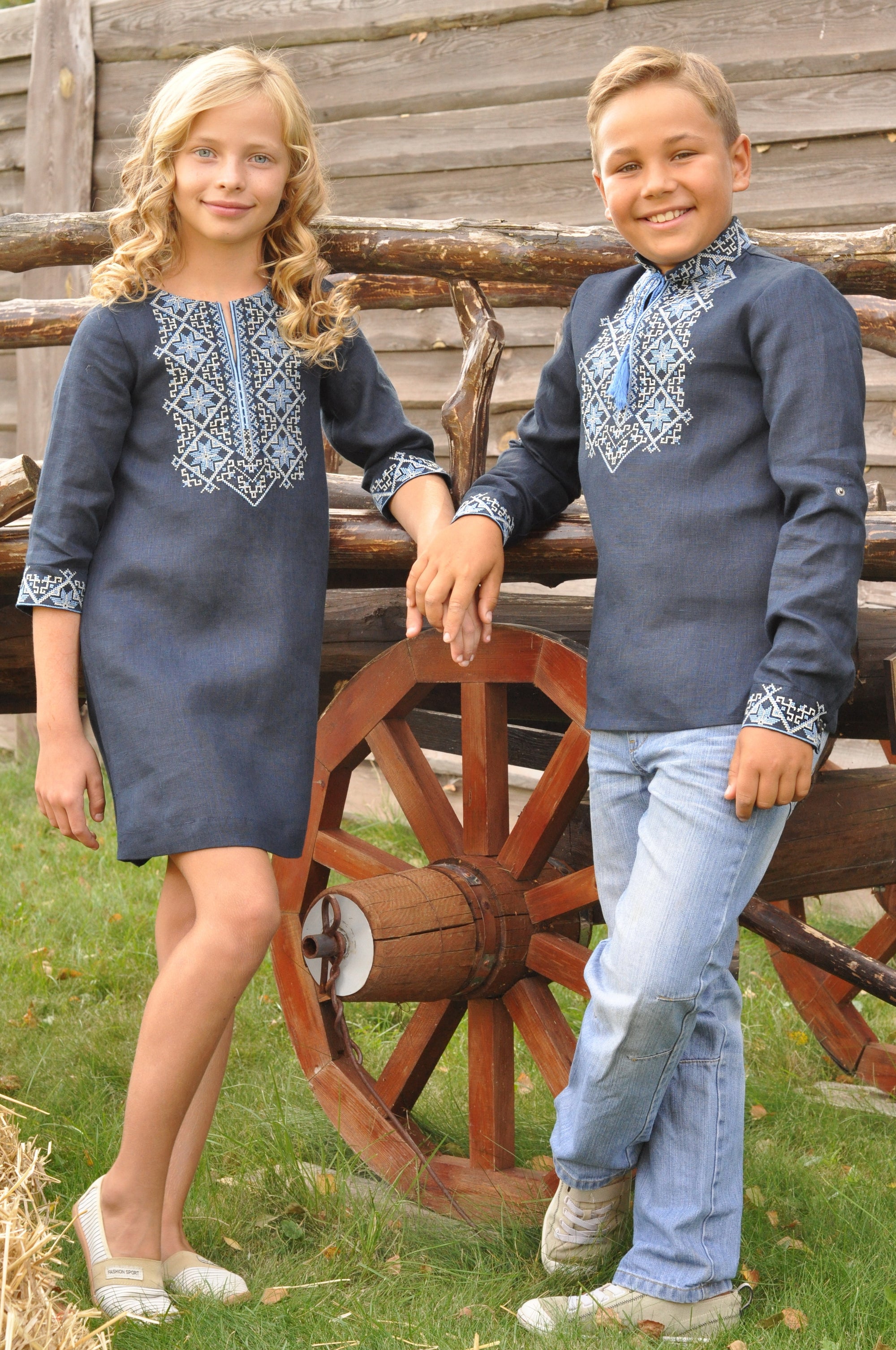 Navy boys’ Ukrainian-style embroidered shirt with transformable sleeves
