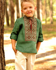Boys’ green embroidered linen shirt with stand collar and traditional ornament