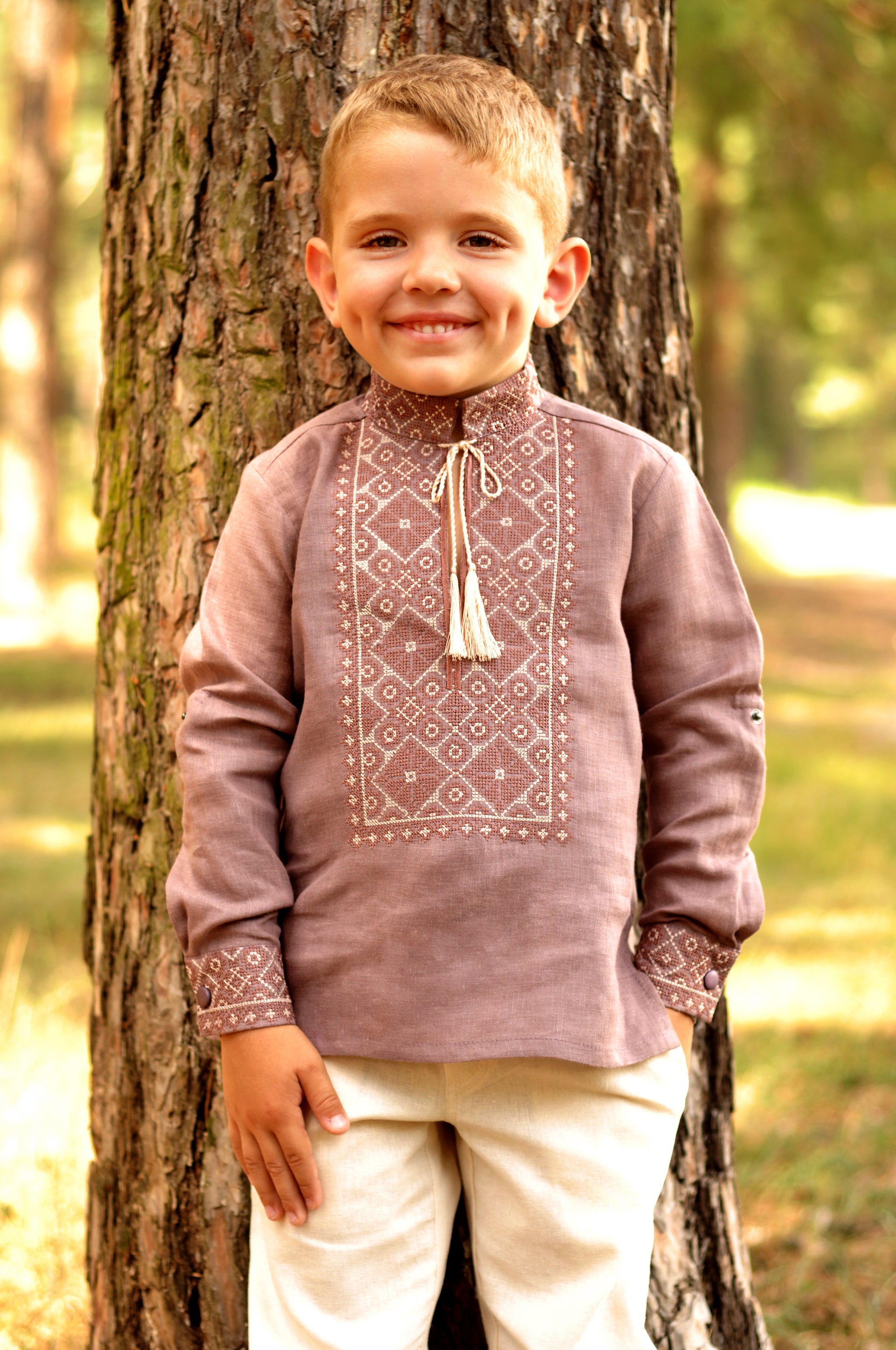 Boys’ cocoa embroidered linen shirt with stand collar and traditional ornament