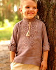 Cocoa linen boys’ vyshyvanka with beige geometric embroidery and sleeves styled as 3/4