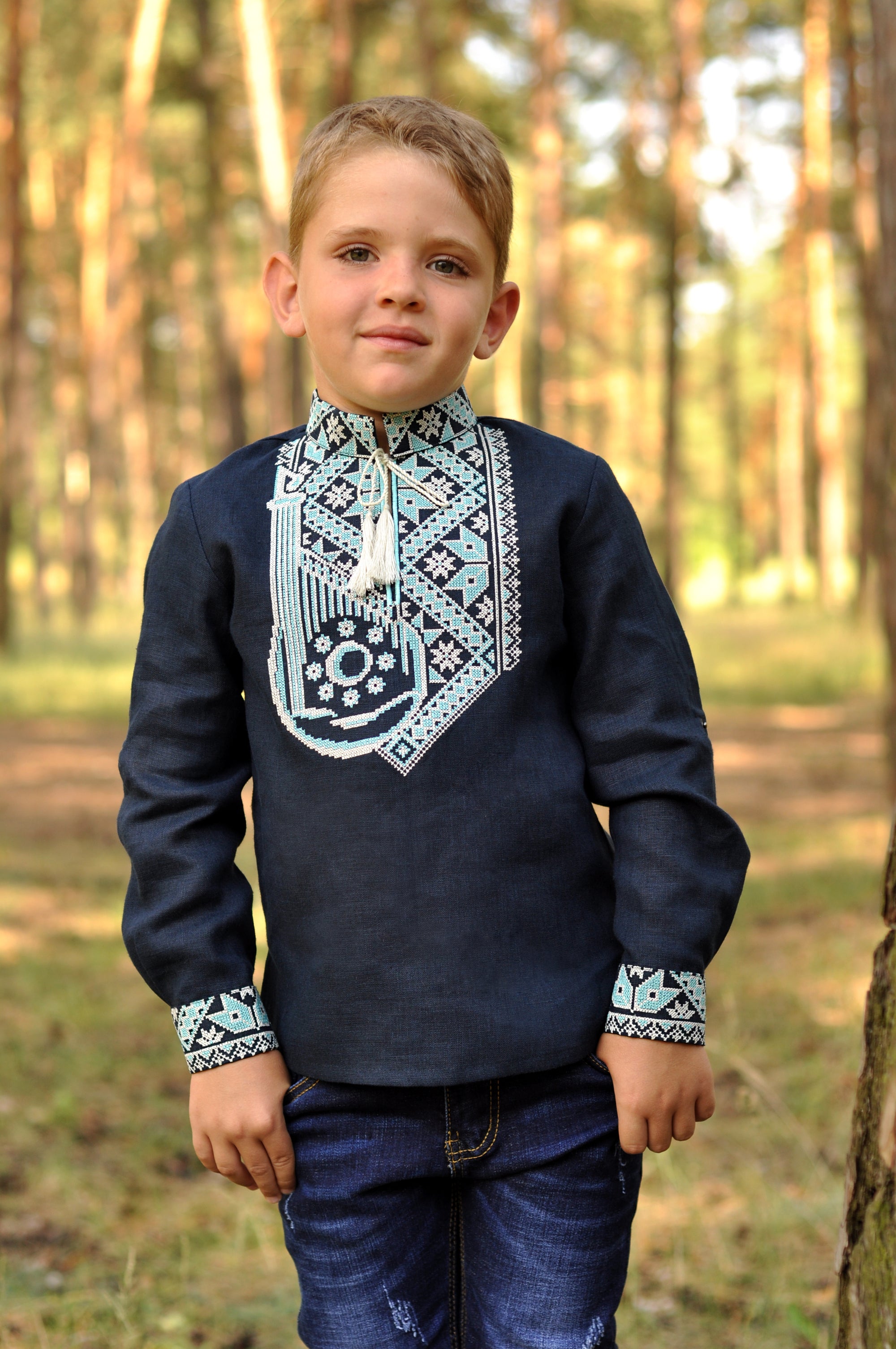 Boys’ navy embroidered linen shirt with light blue and white ornament