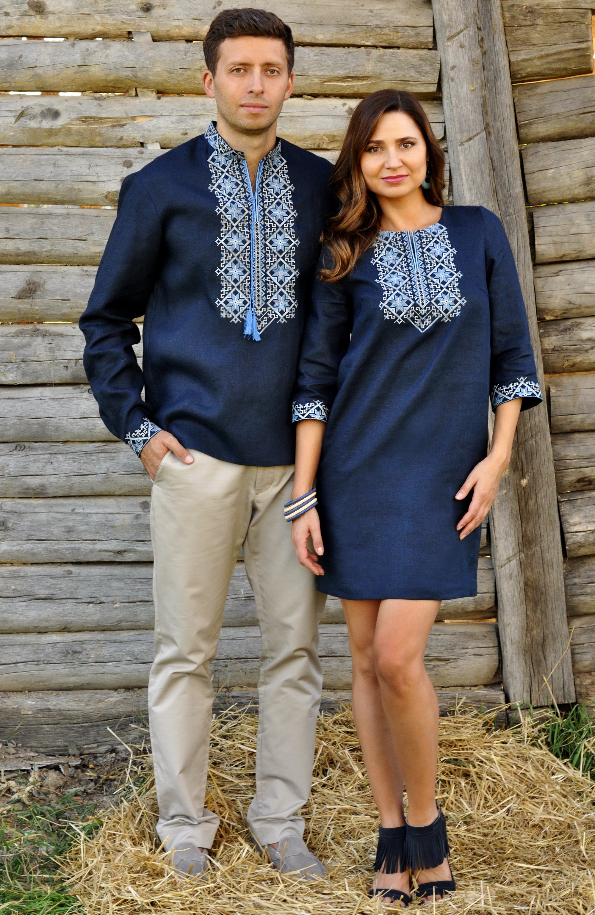 Matching navy linen couple set with men’s embroidered shirt and women’s embroidered mini dress