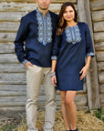 Matching navy linen couple set with men’s embroidered shirt and women’s embroidered mini dress