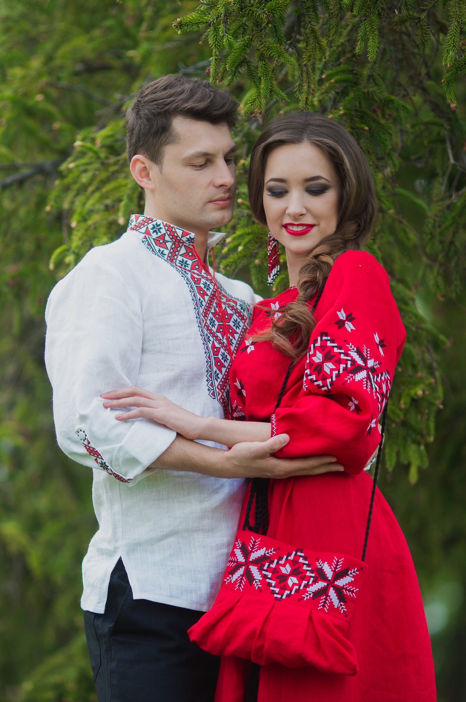 Red linen dress with black and white embroidery on the chest and sleeves
