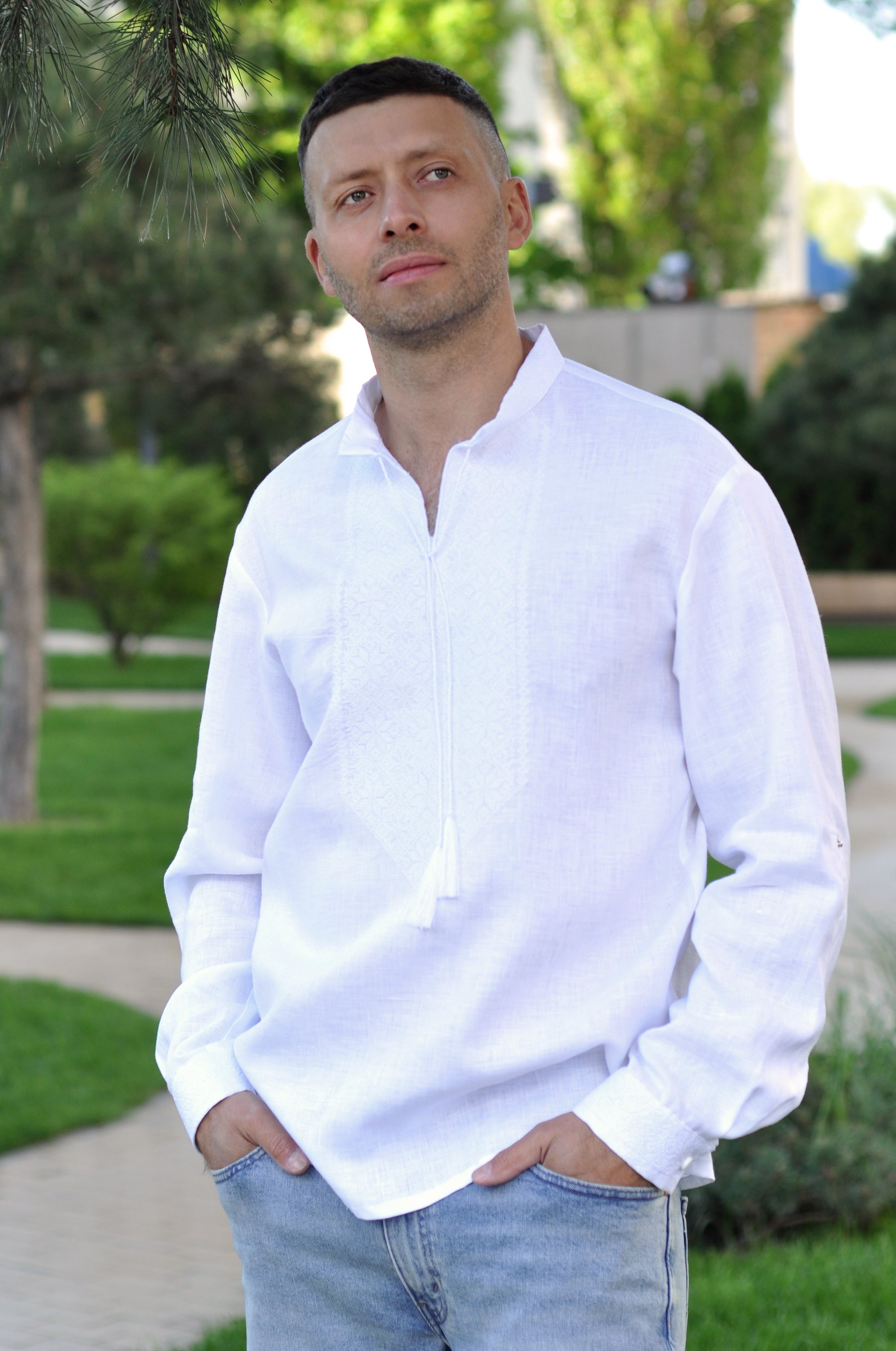 White linen men’s vyshyvanka with white-on-white geometric embroidery
