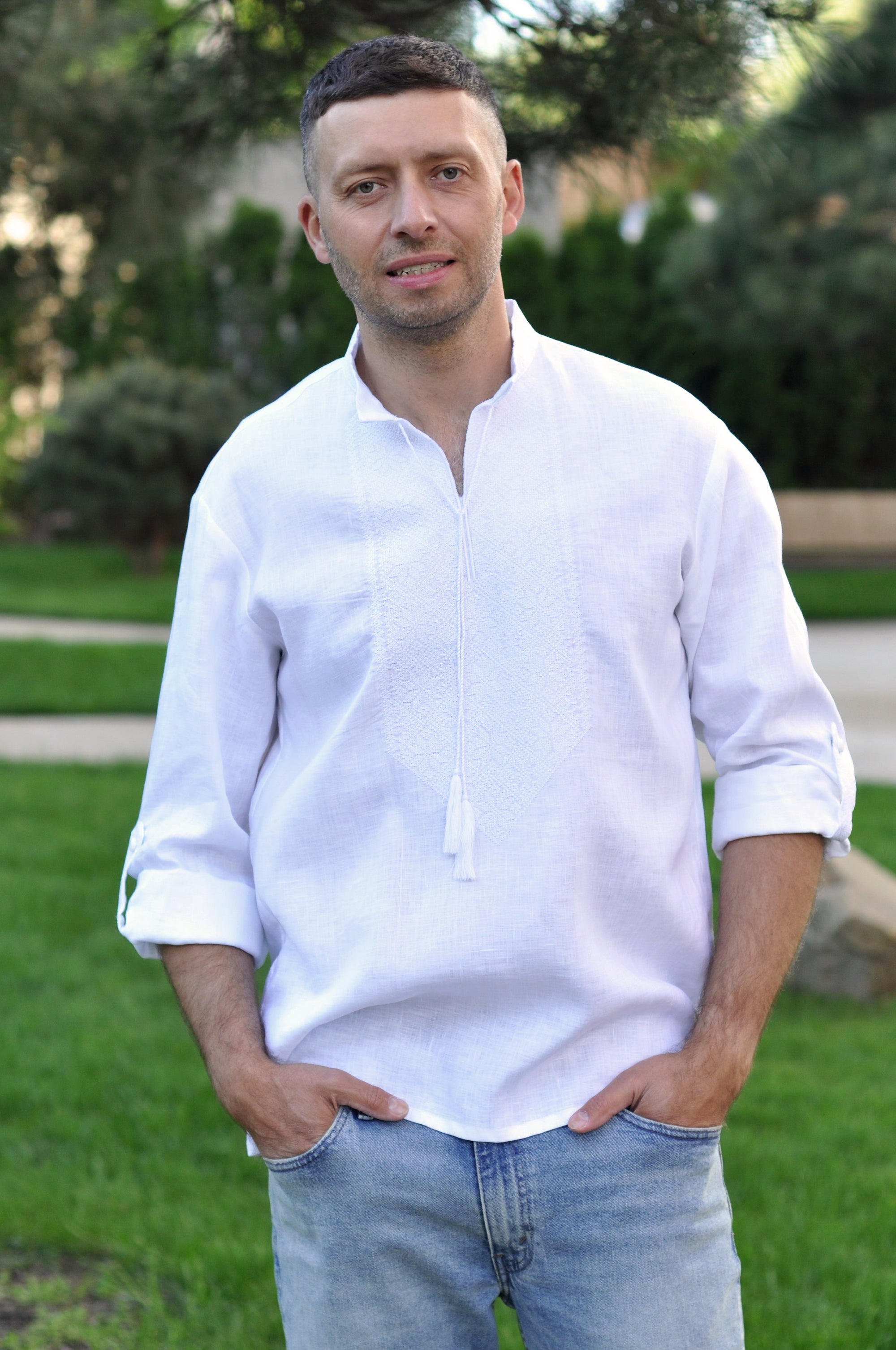 Men’s white embroidered linen shirt with transformable sleeves