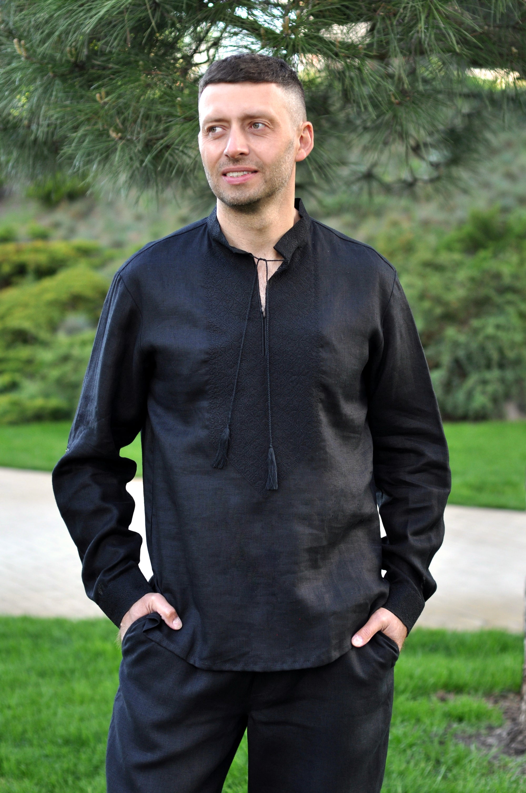 Black men’s linen vyshyvanka with black-on-black embroidery and transformable long sleeves