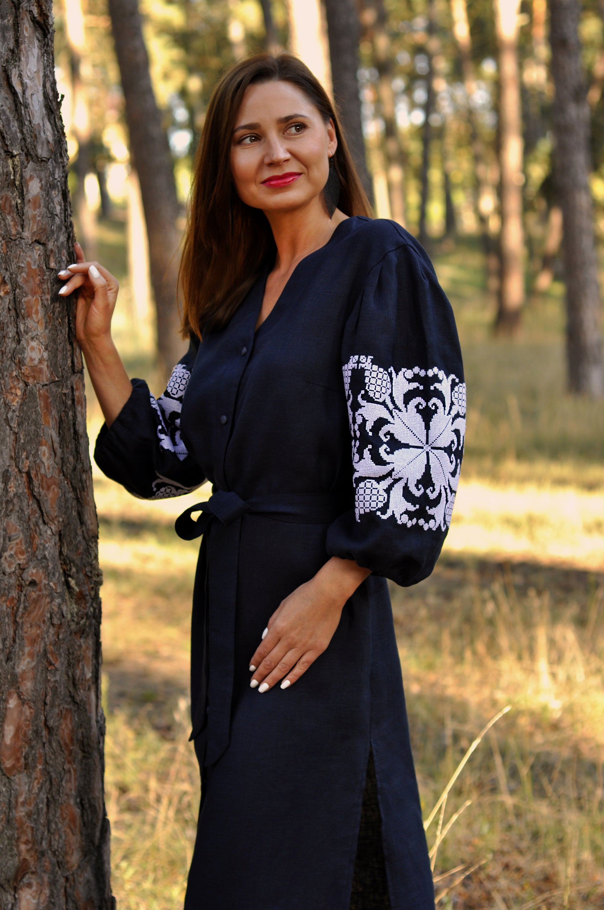 Women’s dark blue embroidered linen dress with contrasting white embroidery