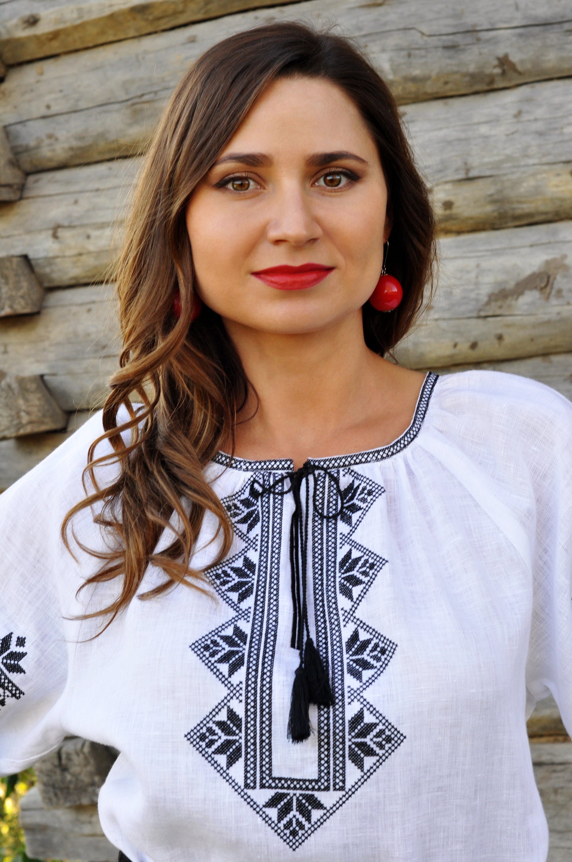 White Ukrainian-style embroidered blouse with black sleeve embroidery