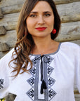 White Ukrainian-style embroidered blouse with black sleeve embroidery
