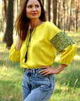 Yellow linen women’s vyshyvanka with blue patriotic embroidery and hidden Trident motif