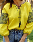 Women’s yellow embroidered blouse in natural linen with 3/4 sleeves