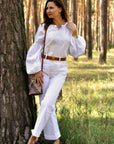 Elegant white Ukrainian-style linen blouse with floral embroidery