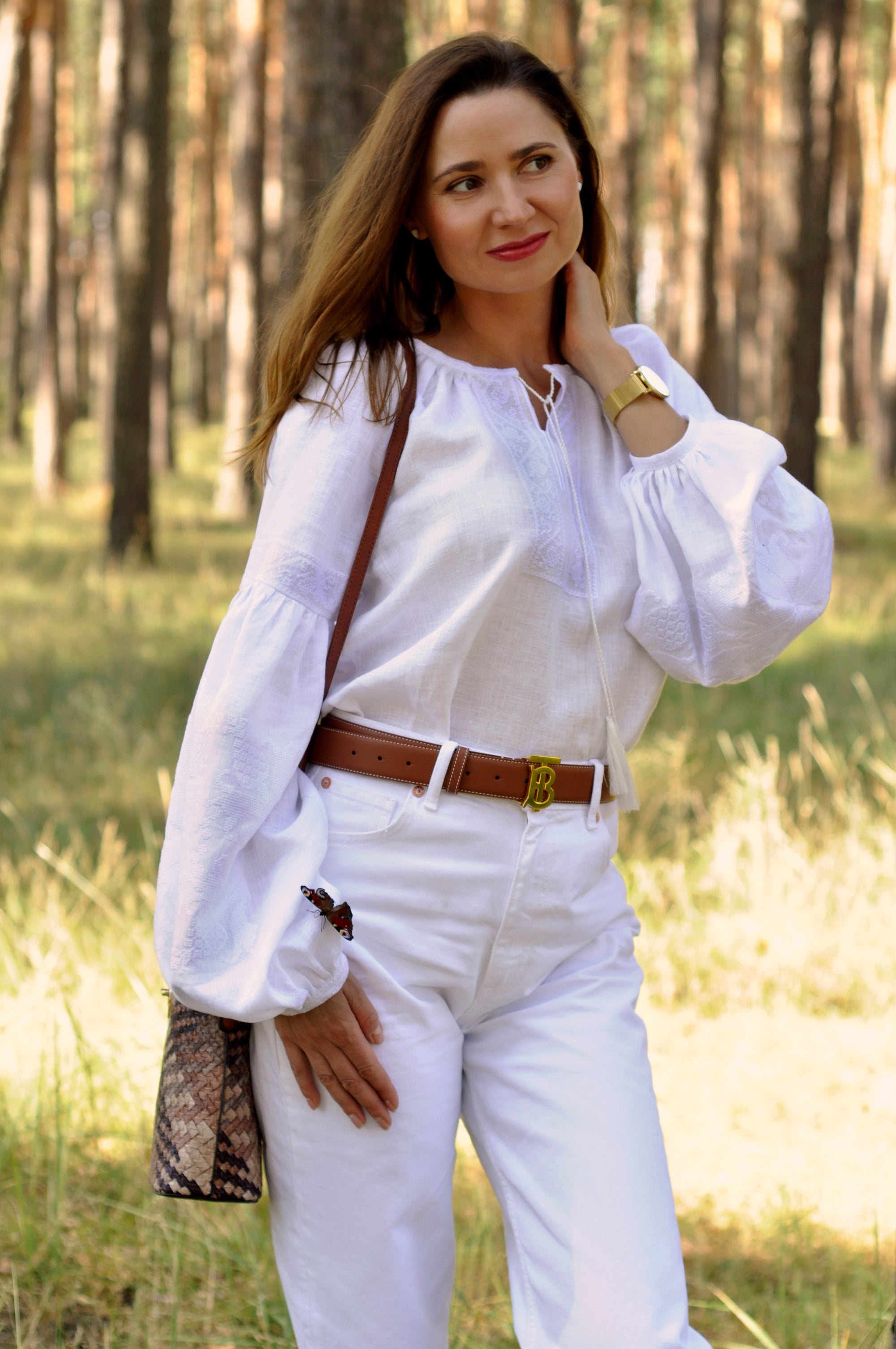 White women’s vyshyvanka in natural linen with refined white embroidery