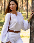 White linen women’s vyshyvanka with white-on-white embroidery
