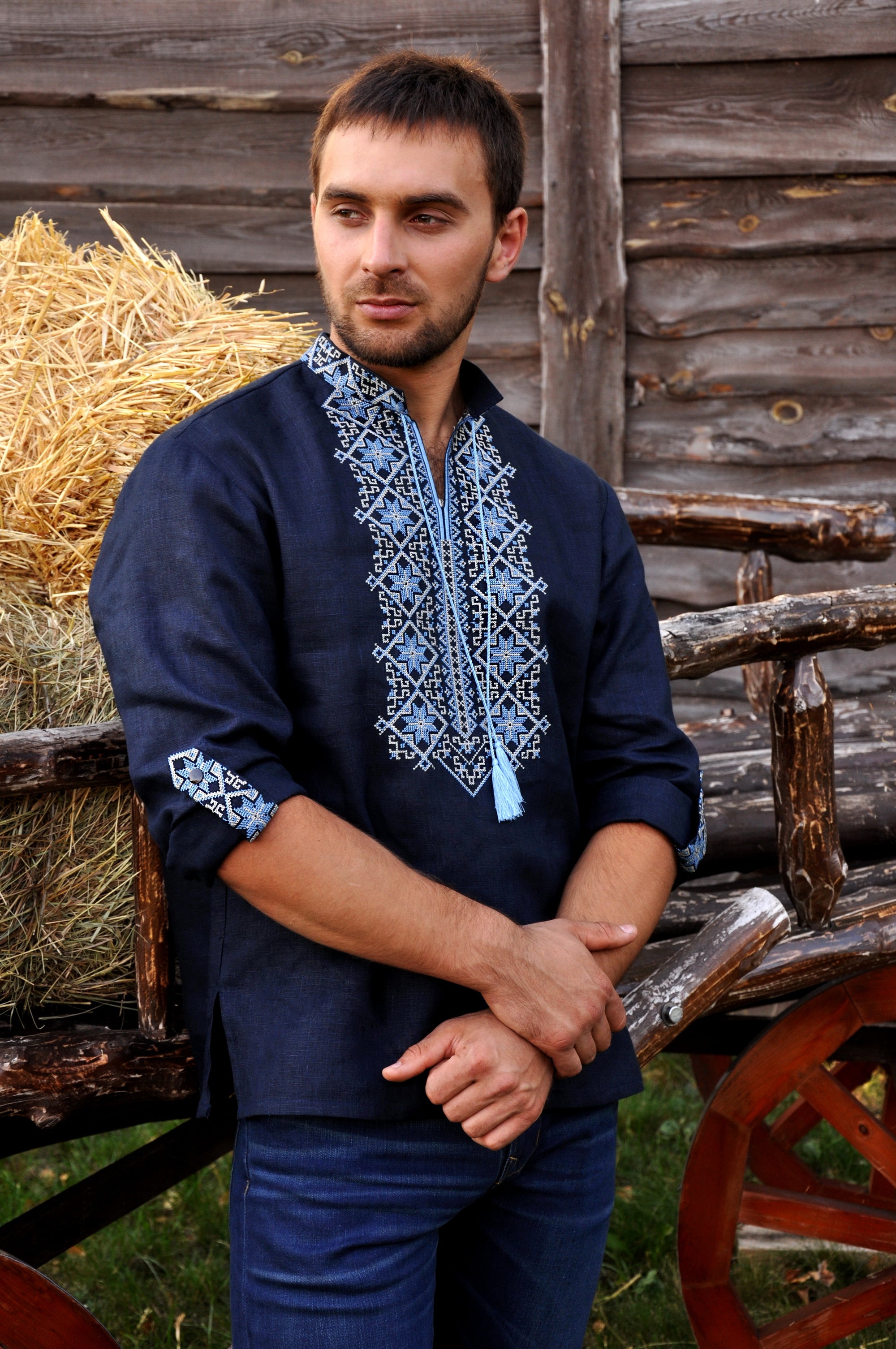 Men’s navy embroidered linen shirt with transformable sleeves and detailed front embroidery