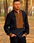 Dark blue embroidered men's shirt with bronze ornament