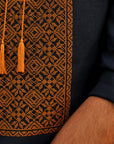 Dark blue embroidered men's shirt with bronze ornament