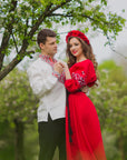 Family look set with men’s white embroidered shirt and women’s red embroidered dress with geometric ornament