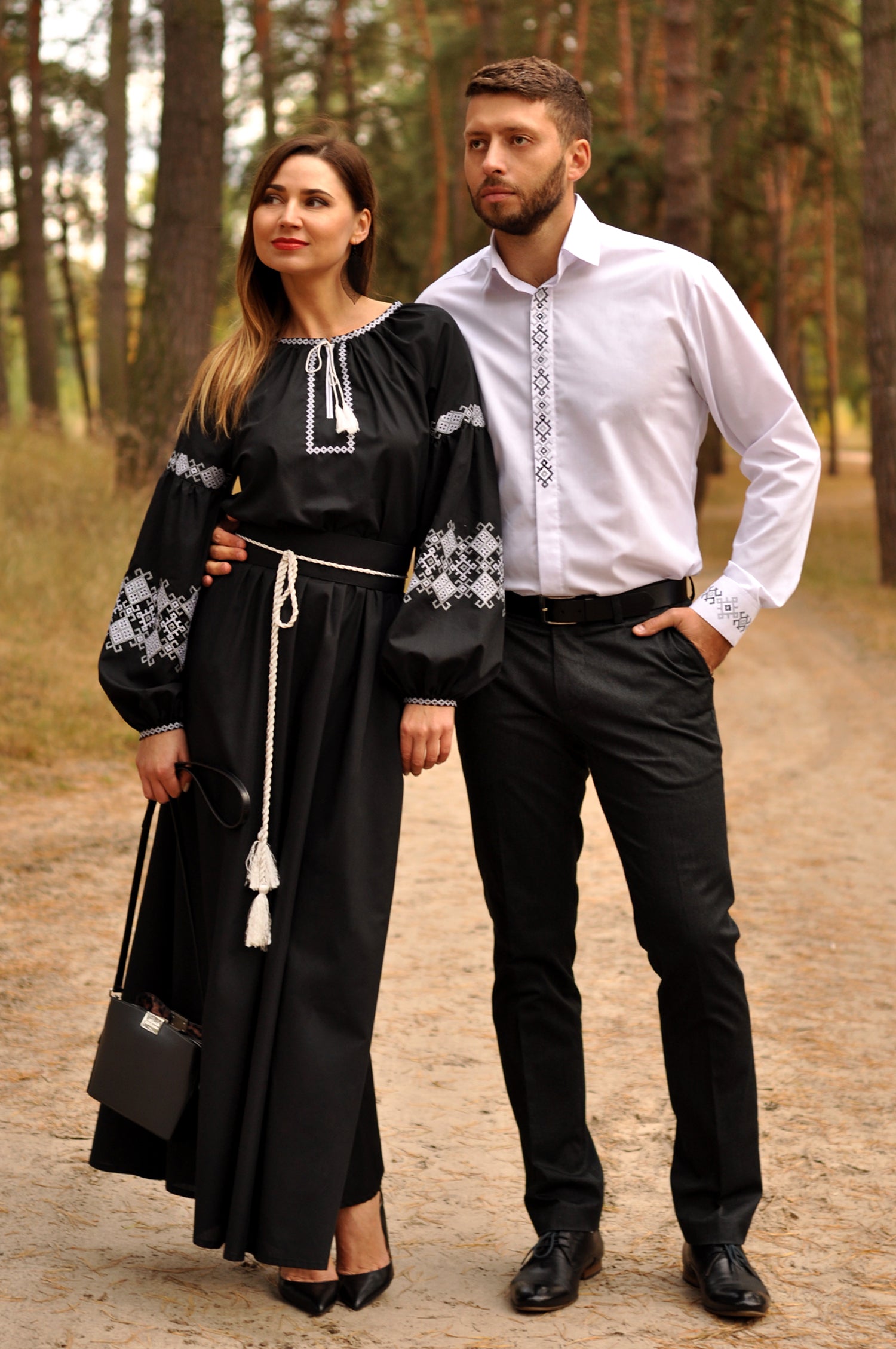Matching cotton couple set with men’s white embroidered shirt and women’s black maxi dress