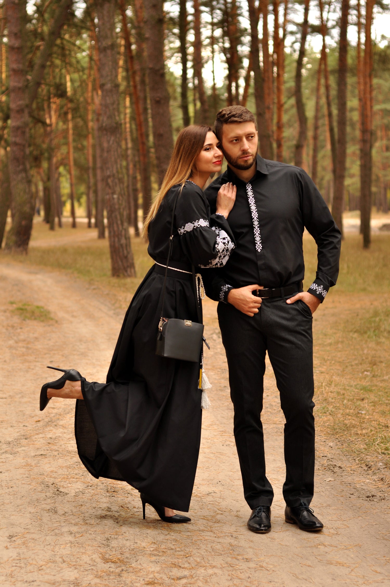 Elegant black embroidered outfit for couples with contrasting grey and white embroidery