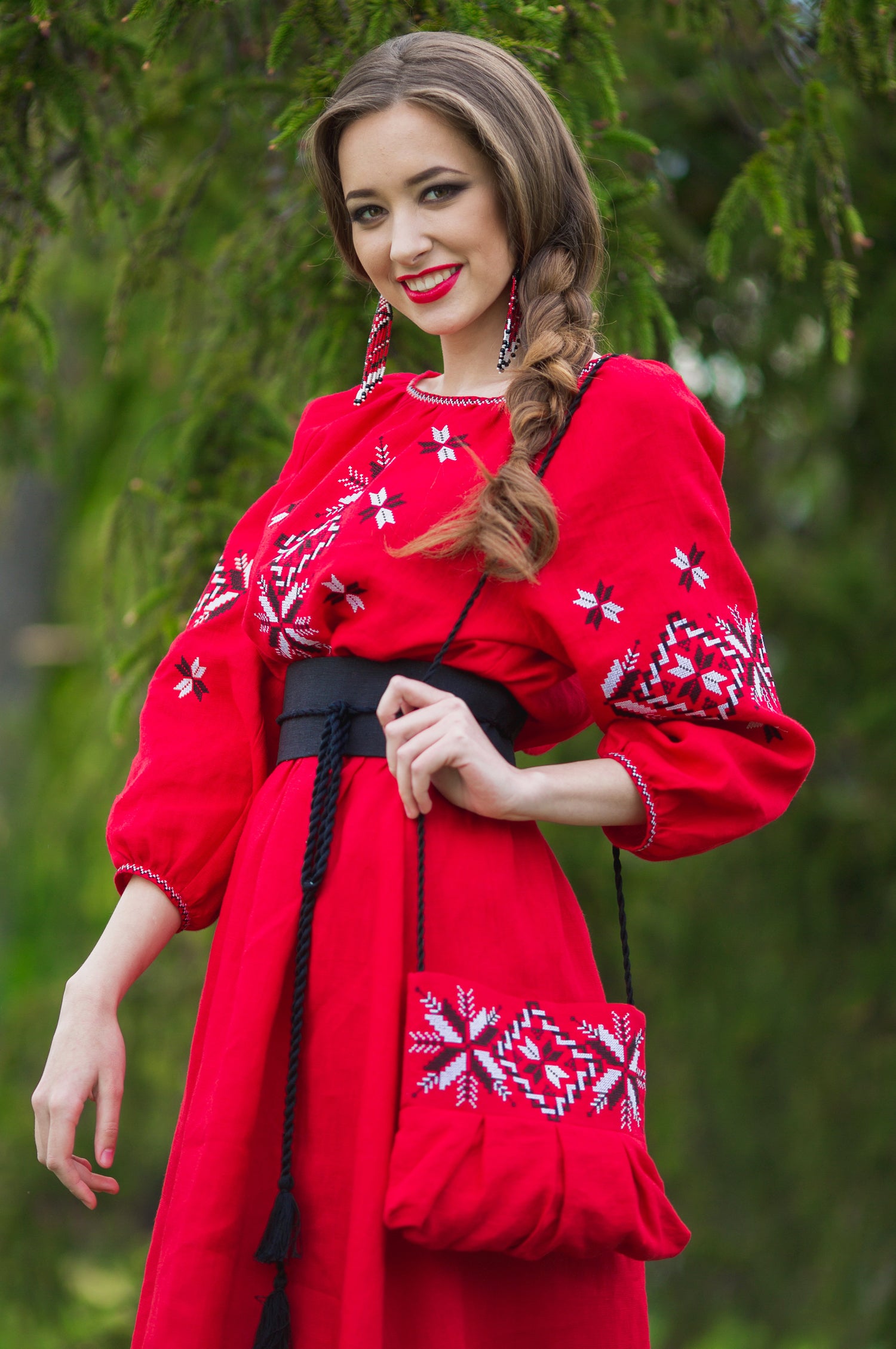 Women’s red embroidered linen dress with long sleeves and contrasting belt