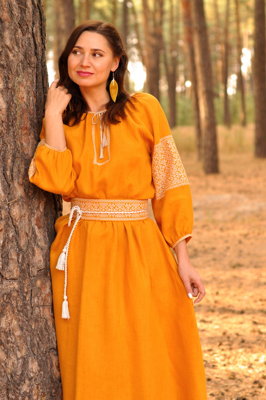 Maxi dress with mustard color embroidery made from natural linen