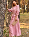 Soft pink linen dress with feminine silhouette and traditional ornament