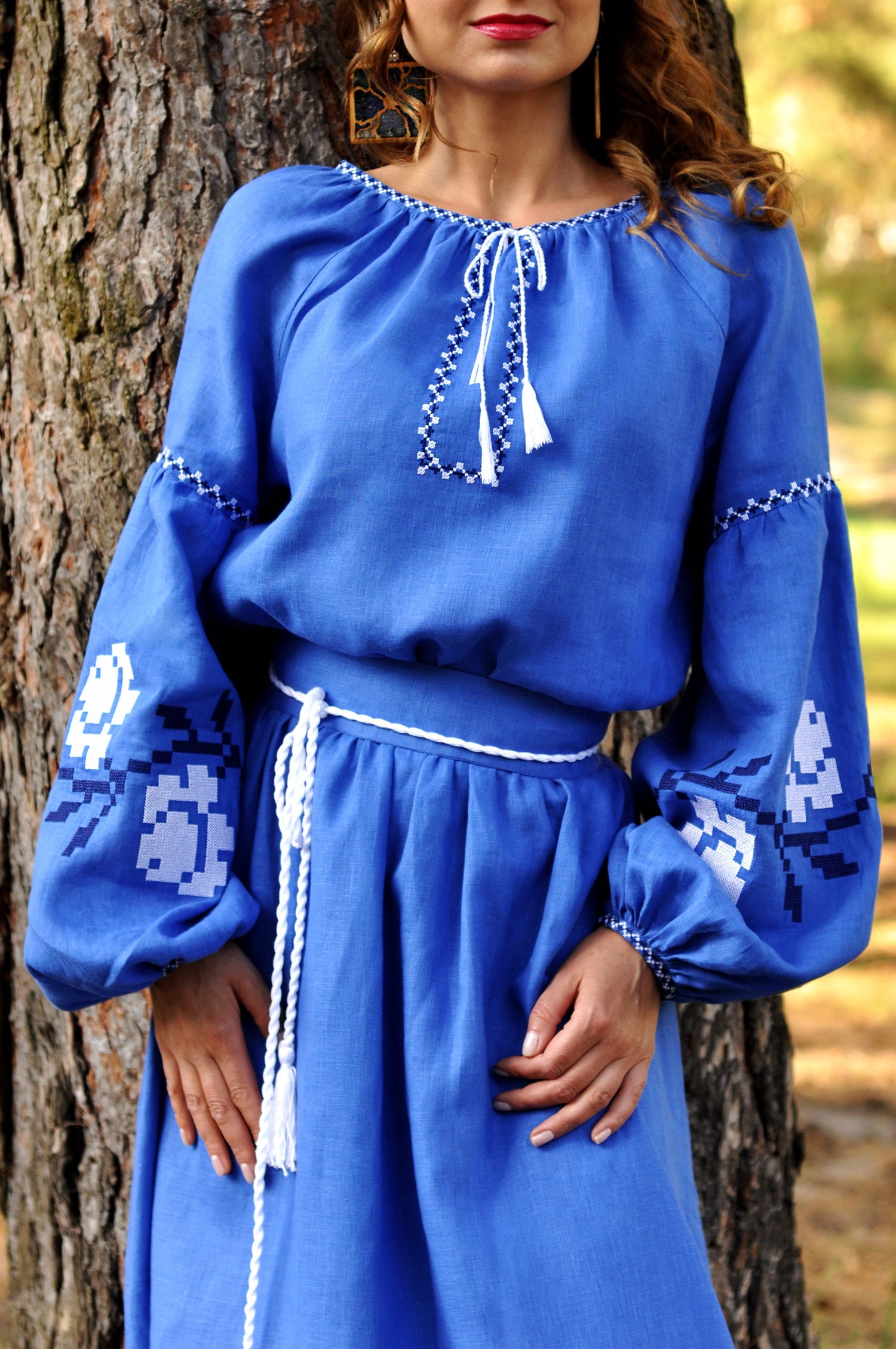 Women’s blue embroidered linen dress with long sleeves and removable belt