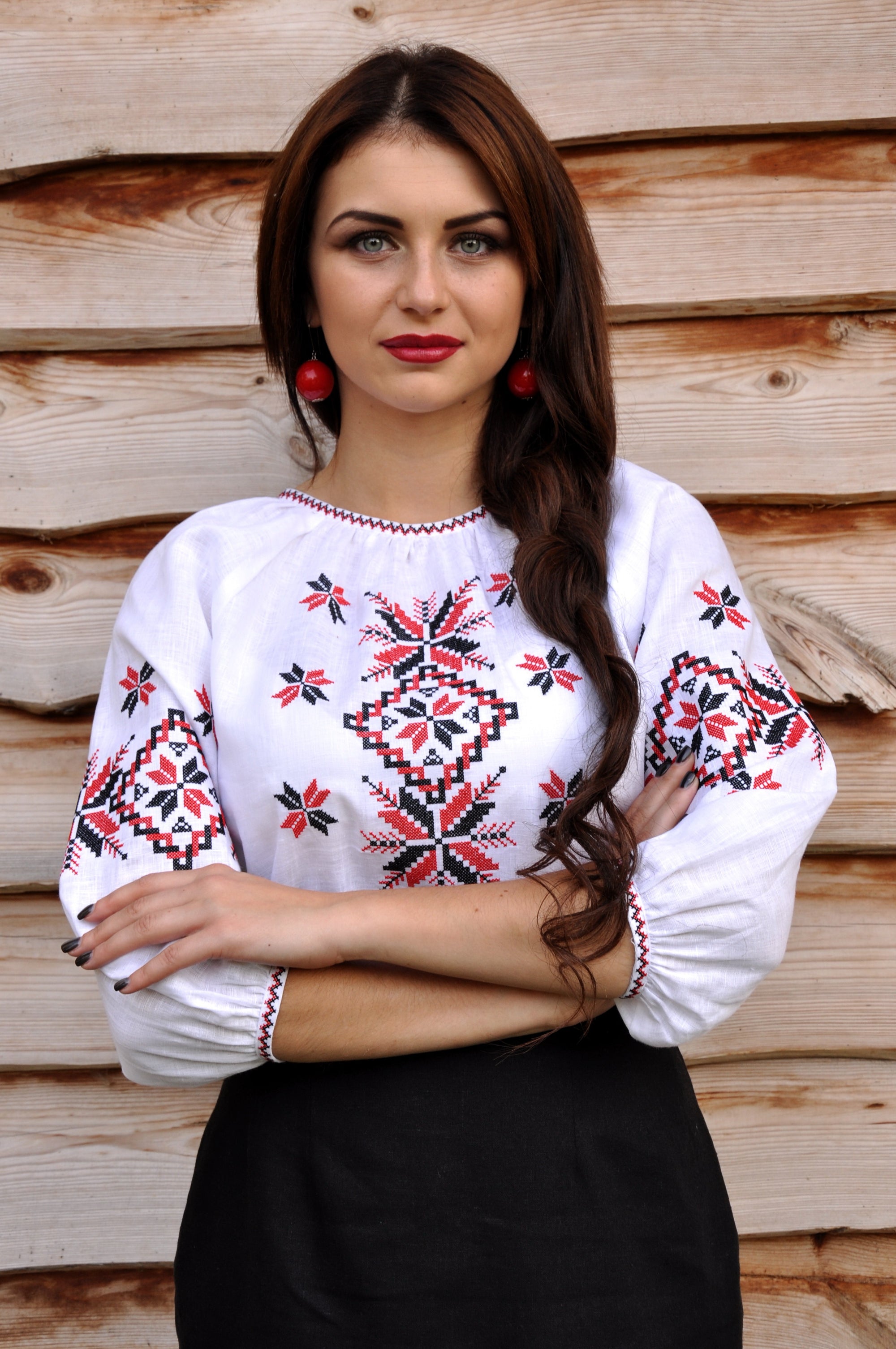 White linen women’s vyshyvanka with traditional red and black embroidery
