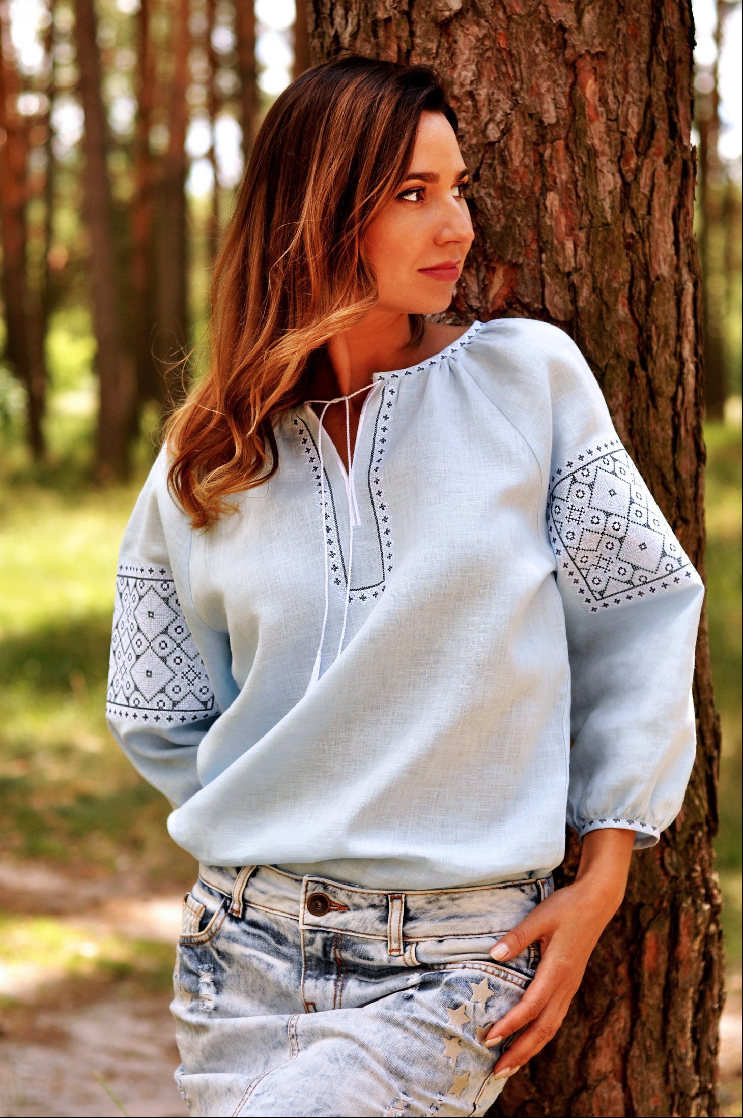 Light blue linen women’s vyshyvanka with white and gray-blue embroidery