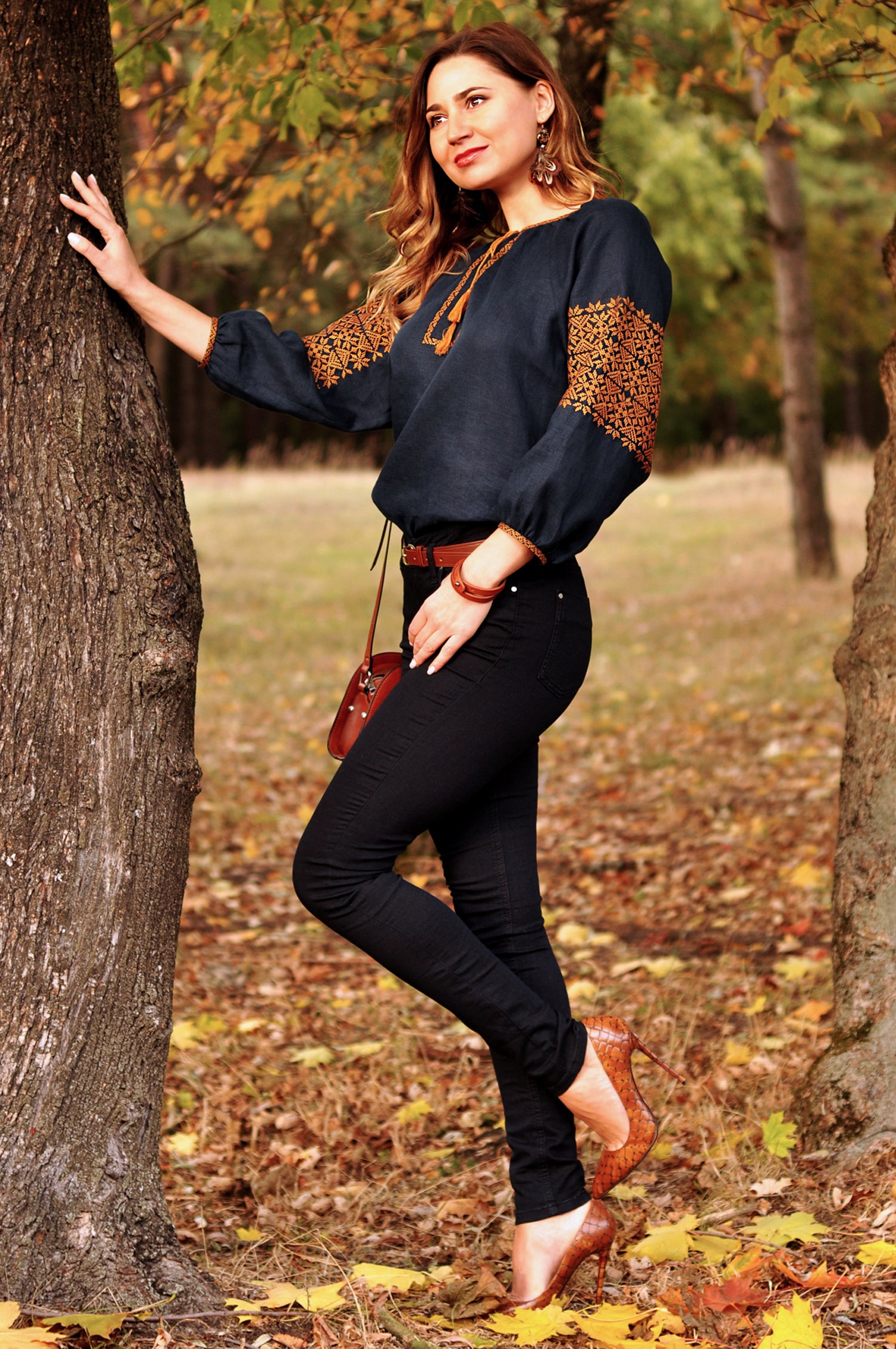 Dark blue Ukrainian-style linen blouse with bronze ornament