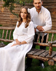 White embroidered wedding dress with long feminine silhouette